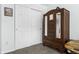Bedroom features a wardrobe and closet for storage and a small workspace at 5944 S Yank Ct, Littleton, CO 80127