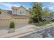 Well-maintained home with a spacious two-car garage, a neat lawn, and easy street parking at 5944 S Yank Ct, Littleton, CO 80127