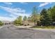 Street view of homes with well-kept lawns and easy street parking for residents and visitors at 5944 S Yank Ct, Littleton, CO 80127