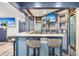 Enjoy the luxury of this basement wet bar with granite counters and seating for 4 at 142 High Point Dr, Breckenridge, CO 80424