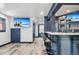 Entertainment basement has a bar, and wall-mounted TVs at 142 High Point Dr, Breckenridge, CO 80424