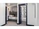 Cozy bedroom featuring a bunk bed with pull-out trundle and an adjacent bathroom at 142 High Point Dr, Breckenridge, CO 80424