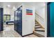 Hallway with stairs, storage and modern finishes at 142 High Point Dr, Breckenridge, CO 80424