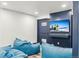 Relaxing living room with plush seating, a large screen TV, and contemporary design at 142 High Point Dr, Breckenridge, CO 80424