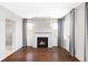 Bright living room with fireplace and hardwood floors at 419 Harrison St, Denver, CO 80206