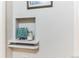 Charming inset wall nook, perfect for displaying art and adding character to the space at 1182 Clermont St # A202, Denver, CO 80220