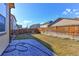 Fenced backyard with a lawn, patio, and privacy fence providing outdoor enjoyment at 2065 E 150Th Pl, Thornton, CO 80602