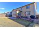 Well-maintained backyard featuring a patio, lawn, and outdoor seating area, perfect for entertaining and relaxation at 2065 E 150Th Pl, Thornton, CO 80602