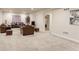 Finished basement with neutral carpet, cozy seating, recessed lighting, and a doorway to additional space at 2065 E 150Th Pl, Thornton, CO 80602
