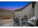 Inviting backyard patio with stylish seating arrangement and cozy outdoor space for relaxation at 13744 W 86Th Dr, Arvada, CO 80005