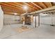 Spacious unfinished basement with exposed ceiling and concrete floors ready for your creative ideas at 13744 W 86Th Dr, Arvada, CO 80005