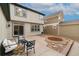 Cozy outdoor patio featuring stylish furniture, perfect for relaxing and enjoying the fresh air at 13744 W 86Th Dr, Arvada, CO 80005