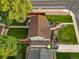 Aerial view of a home with mature landscaping and a well-manicured lawn at 488 S Leyden St, Denver, CO 80224