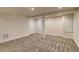 Finished basement featuring carpeted floors and bright open space with windows at 488 S Leyden St, Denver, CO 80224