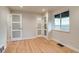 Bright bedroom with hardwood floors, recessed lighting, and modern paneled doors at 488 S Leyden St, Denver, CO 80224