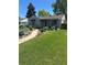Well-maintained home with walkway, green lawn and beautiful landscaping at 488 S Leyden St, Denver, CO 80224