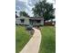Charming home features a well-manicured lawn and lush landscaping at 488 S Leyden St, Denver, CO 80224