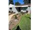 Landscaped front yard with walkway leading to home's entrance at 488 S Leyden St, Denver, CO 80224