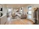 Bright living room features a modern sofa, stylish coffee table, and large windows for abundant natural light at 488 S Leyden St, Denver, CO 80224