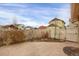 Backyard with stamped concrete patio and wooden fence at 21719 E Tallkid Ave, Parker, CO 80138