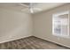 Bright bedroom with ceiling fan and window blinds at 21719 E Tallkid Ave, Parker, CO 80138