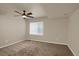 Spacious carpeted bedroom with ceiling fan and window blinds at 21719 E Tallkid Ave, Parker, CO 80138