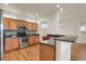 Kitchen with stainless steel appliances and granite countertops at 21719 E Tallkid Ave, Parker, CO 80138