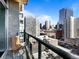 Relaxing balcony with seating and expansive views of the city skyline at 891 14Th St # 1211, Denver, CO 80202