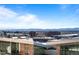 Expansive city skyline view with mountains in the distance from the rooftop of the condo at 891 14Th St # 1211, Denver, CO 80202