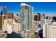 Exterior view of condo building featuring modern architectural design and city skyline views at 891 14Th St # 1211, Denver, CO 80202