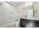 Modern bathroom featuring a glass-enclosed shower, subway tile, and a vanity with plenty of storage at 2321 Lakeshore Ln # 10, Superior, CO 80027