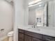 Powder room boasts modern vanity with quartz counters at 2321 Lakeshore Ln # 10, Superior, CO 80027