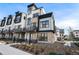 Modern townhome showcases a striking architectural design with stone and contemporary finishes at 2321 Lakeshore Ln # 10, Superior, CO 80027