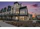 Modern townhome showcases a striking architectural design with stone and contemporary finishes at 2321 Lakeshore Ln # 10, Superior, CO 80027