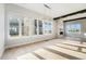 Bright and open living room with hardwood floors, a fireplace, and plenty of natural light at 2321 Lakeshore Ln # 10, Superior, CO 80027