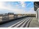 Rooftop deck showing the deck surface and railing with beautiful view of the town at 2321 Lakeshore Ln # 10, Superior, CO 80027