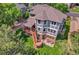 Aerial view of beautiful home featuring a multi-level deck and landscaped backyard at 10822 Eagle Crest Ct, Parker, CO 80138