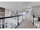 Upstairs hallway featuring carpet, neutral walls and access to the living spaces at 10822 Eagle Crest Ct, Parker, CO 80138