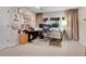 Bright home office featuring two workstations, large windows, comfortable chair, and decor at 10822 Eagle Crest Ct, Parker, CO 80138