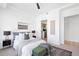 Cozy bedroom features a comfortable bed, stylish decor, and ample natural light at 1750 Wewatta St # 1825, Denver, CO 80202