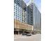Modern high-rise building with contemporary design and street-level retail at 1750 Wewatta St # 1825, Denver, CO 80202