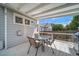 Outdoor patio with grill and dining table, offering a perfect spot for entertaining and relaxing at 13152 E 104Th Dr, Commerce City, CO 80022