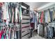 Spacious walk-in closet with custom shelving, hanging rods, and ample storage for organization at 13152 E 104Th Dr, Commerce City, CO 80022