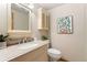 Cozy bathroom with decorative mirror, cabinet, and decor at 3933 W 102Nd Ave, Westminster, CO 80031