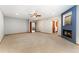 Large bedroom with a fireplace, ceiling fan, and multiple entry points to other rooms at 3933 W 102Nd Ave, Westminster, CO 80031