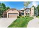 Charming two-story brick home with attached garage and inviting landscaped front yard at 3933 W 102Nd Ave, Westminster, CO 80031