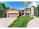 Charming brick home featuring a two-car garage, well-manicured lawn, and inviting curb appeal in a peaceful setting at 3933 W 102Nd Ave, Westminster, CO 80031