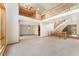 Open living area with vaulted ceilings, staircase and large windows allowing ample light at 3933 W 102Nd Ave, Westminster, CO 80031
