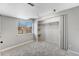 Bedroom offering nice natural light and shelving at 13025 W 63Rd Pl # C, Arvada, CO 80004