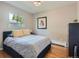 Guest bedroom with hardwood floors and window at 879 S Hudson St, Denver, CO 80246